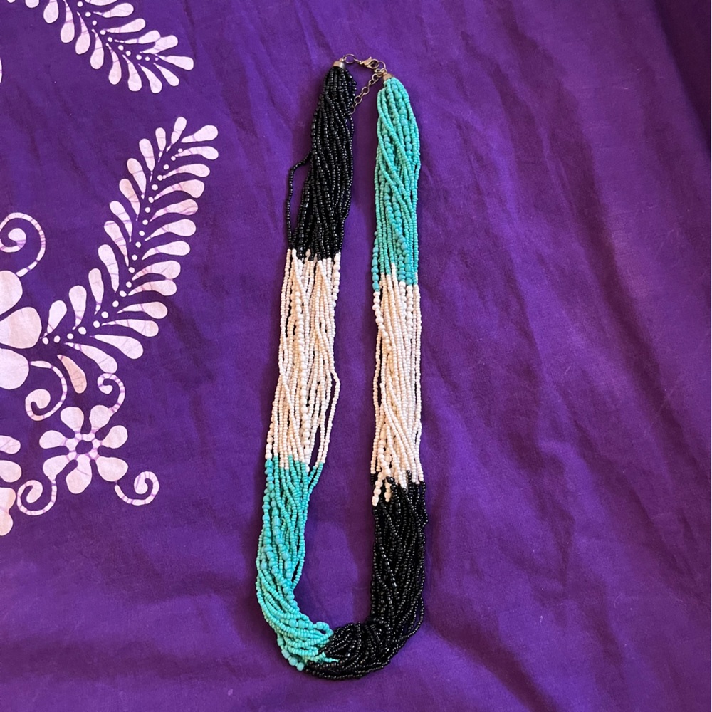 Turquoise, black, and white beaded necklace